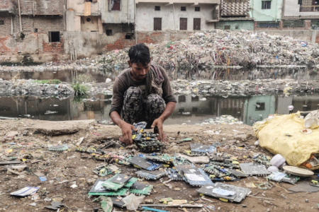 Worker Sorting Ewaste